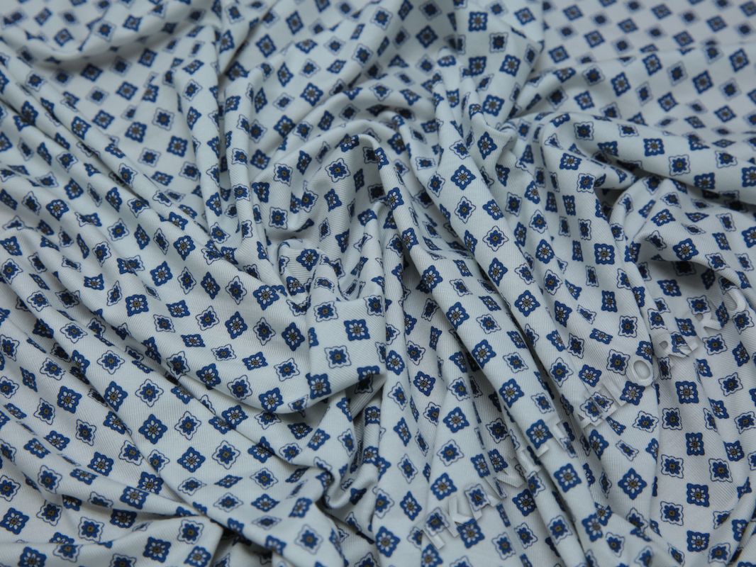 Трикотажная ткань белая с синим орнаментом - фото 5